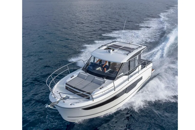 Slide: The Image of 2026 Jeanneau NC 895 Series 2 cruising on open water, showcasing sleek design and performance. - 5