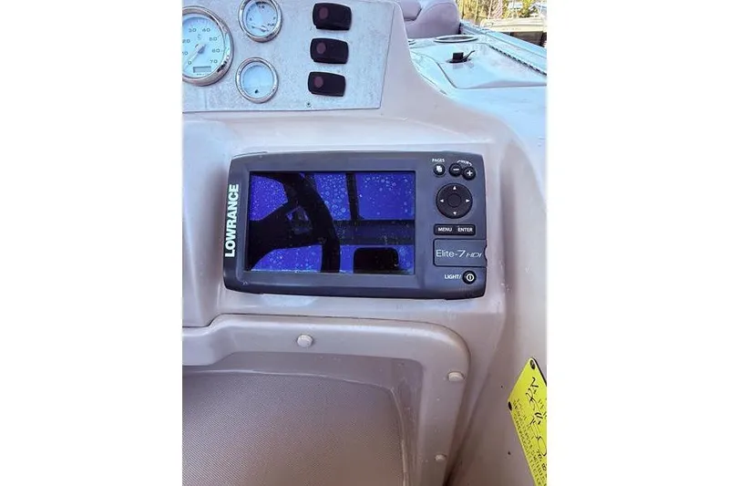 Slide: The Image of Dashboard of 2013 Crest Classic 230 SLC with Lowrance Elite-7 HDI display. - 30