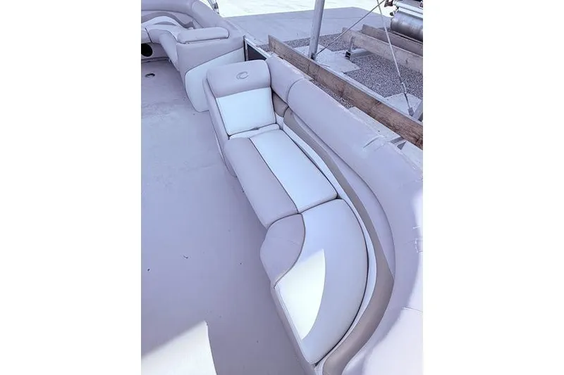 Slide: The Image of 2013 Crest Classic 230 SLC boat interior with white cushioned seating. - 33