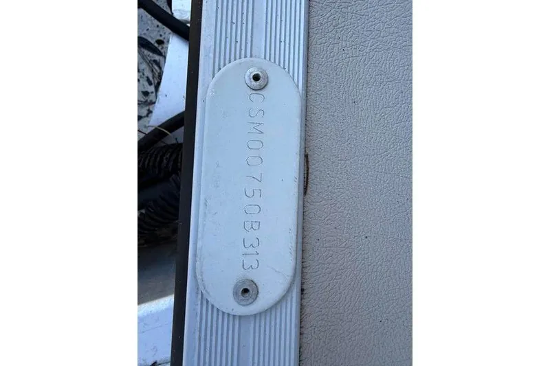 Slide: The Image of Serial number plate on 2013 Crest Classic 230 SLC boat. - 35