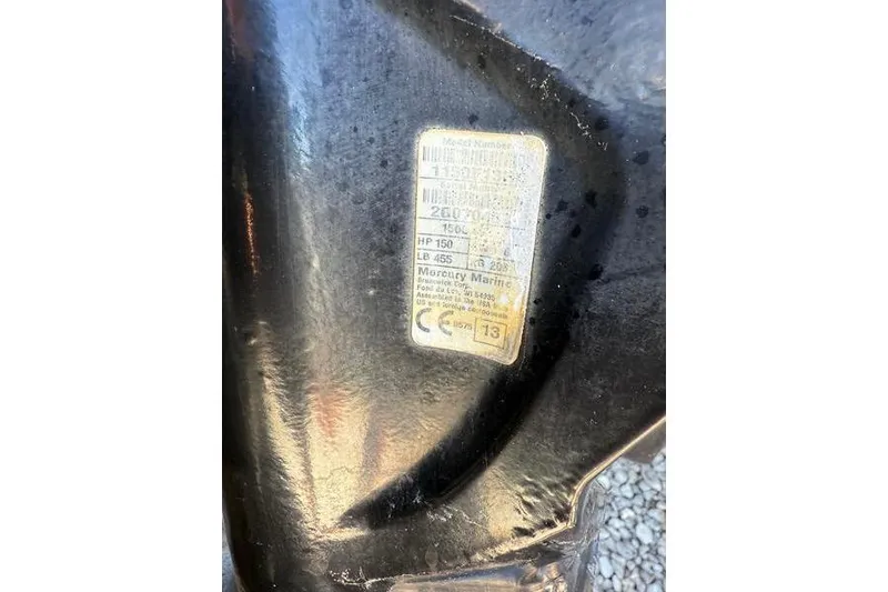 Slide: The Image of Label on 2013 Crest Classic 230 SLC boat engine, showing specifications and Mercury Marine branding. - 36