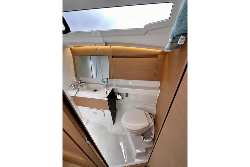 Slide: The Image of 2024 Jeanneau Sun Odyssey 410 bathroom with modern fixtures and sleek design. - 84