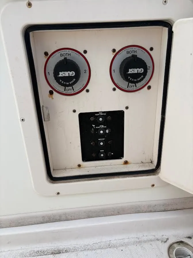 Slide: The Image of Battery control panel on a 2002 Grady-White Marlin 300 boat. - 18