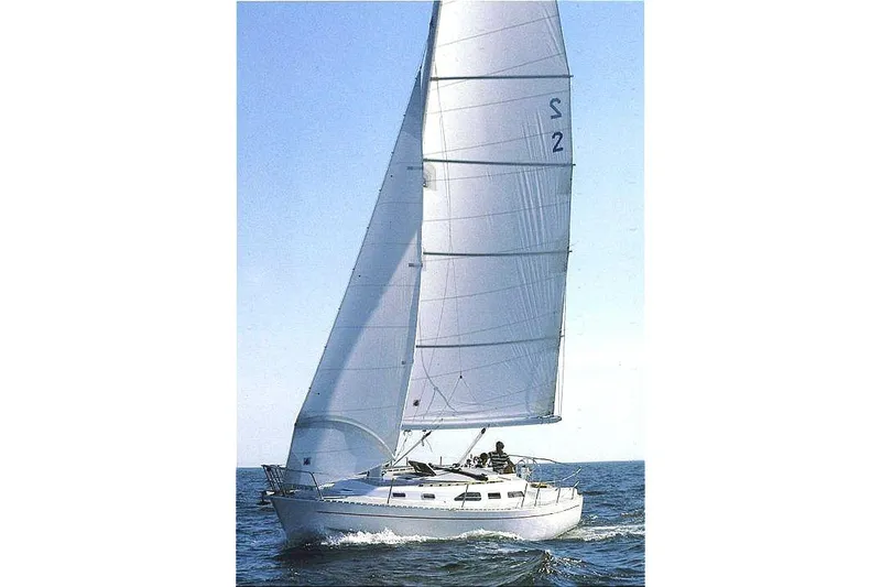 The Image of 1988 Freedom Yachts FREEDOM 36 sailboat navigating on open water. - 0
