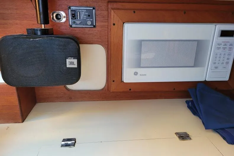 Slide: The Image of Interior of 1988 Freedom 36 yacht with JBL speaker and GE microwave. - 12