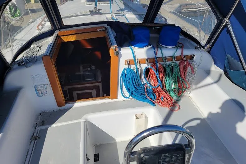 Slide: The Image of Cockpit of 1988 Freedom Yachts FREEDOM 36 with lines organized with color coding - 8