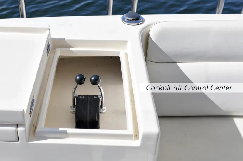 Slide: The Image of Cockpit aft control center of 2004 McKinna 57 Pilothouse yacht. - 12