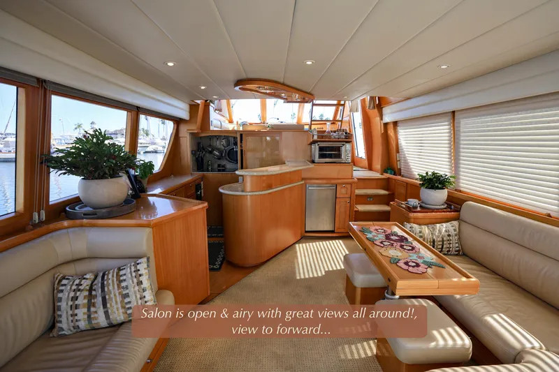 Slide: The Image of Luxurious 2004 McKinna 57 Pilothouse yacht interior with spacious salon and panoramic views. - 15