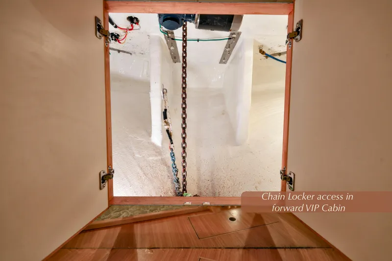 Slide: The Image of Chain locker access in 2004 McKinna 57 Pilothouse forward VIP cabin. - 40
