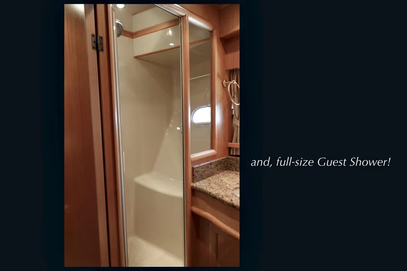 Slide: The Image of Luxurious full-size guest shower in 2004 McKinna 57 Pilothouse yacht. - 44