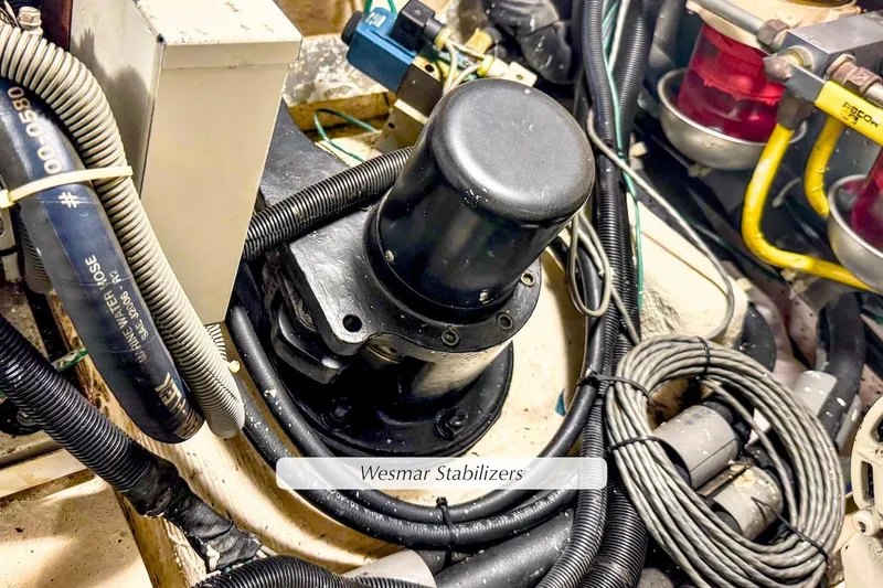 Slide: The Image of Engine room of 2004 McKinna 57 Pilothouse with Wesmar stabilizers and wiring. - 50