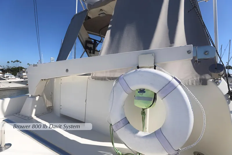 Slide: The Image of 2004 McKinna 57 Pilothouse with Brower 800 lb Davit System and life preserver. - 8