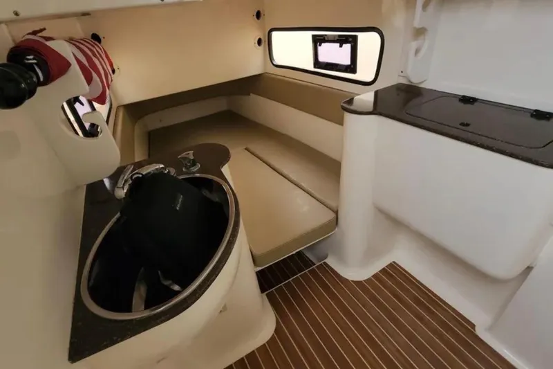 Slide: The Image of 2017 Scout 350 LXF cabin interior with sink, seating, and window. - 73