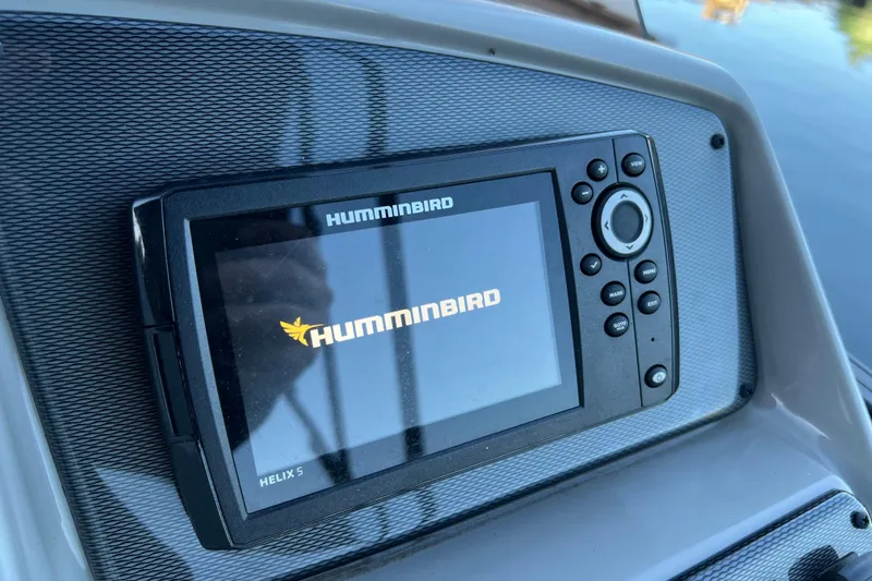Slide: The Image of Humminbird Helix 5 fish finder on 2025 Starcraft EXS 3 Q DH boat dashboard. - 9