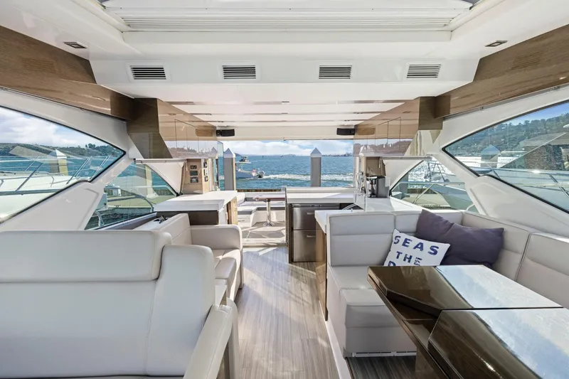 Slide: The Image of Luxurious interior of 2019 Cruisers Yachts 54 Cantius with scenic ocean view. - 43