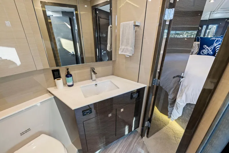 Slide: The Image of Luxurious bathroom in 2019 Cruisers Yachts 54 Cantius, featuring modern sink and elegant decor. - 49