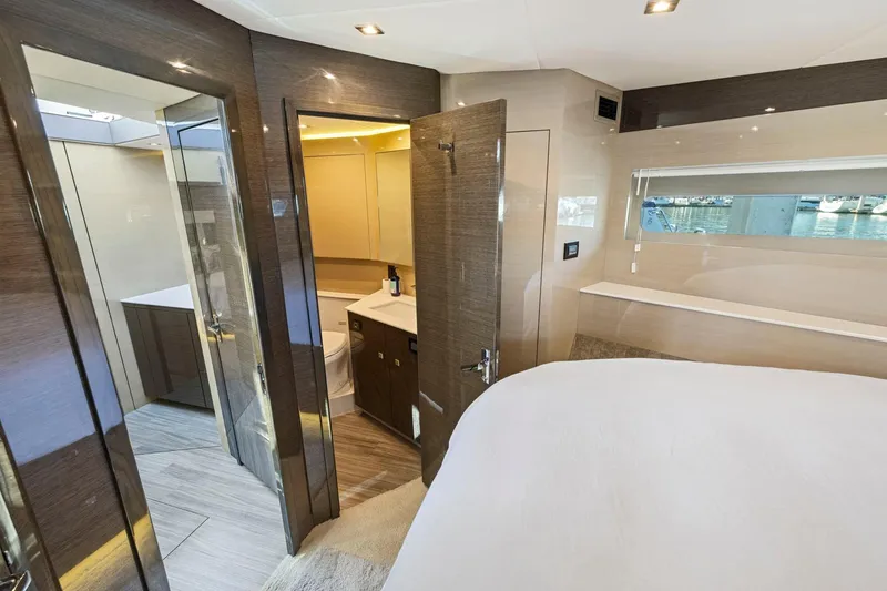 Slide: The Image of Luxurious interior of 2019 Cruisers Yachts 54 Cantius with modern bathroom and bedroom. - 56
