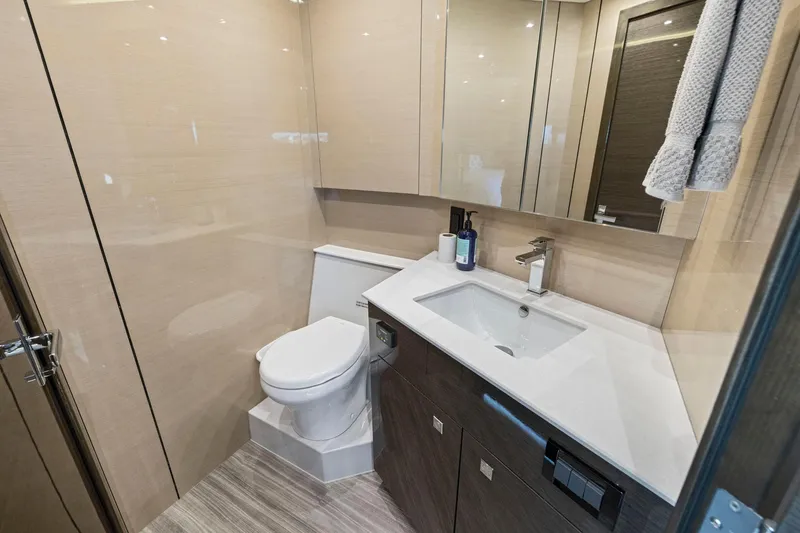 Slide: The Image of Luxurious bathroom in 2019 Cruisers Yachts 54 Cantius, featuring modern fixtures and elegant design. - 57