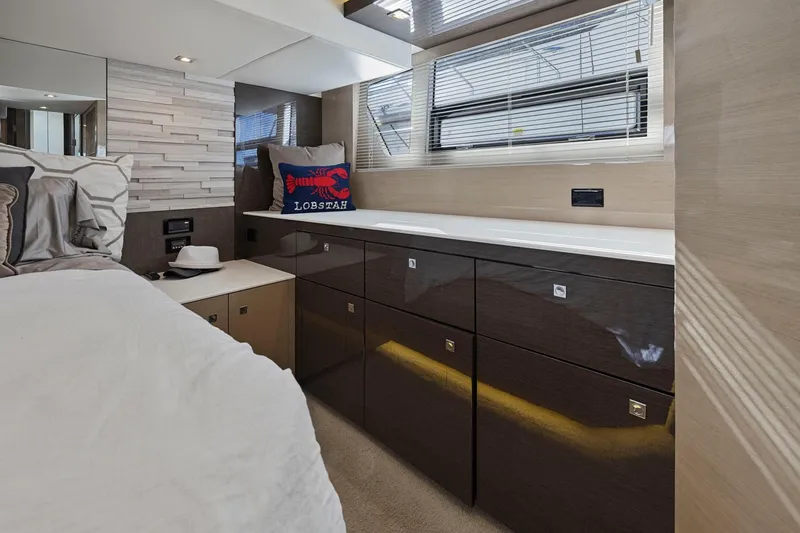 Slide: The Image of Luxurious interior of 2019 Cruisers Yachts 54 Cantius with modern cabinetry and nautical decor. - 65