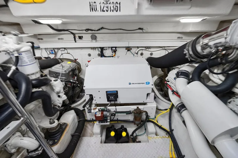 Slide: The Image of Engine room of 2019 Cruisers Yachts 54 Cantius with Seakeeper 9 stabilizer. - 72
