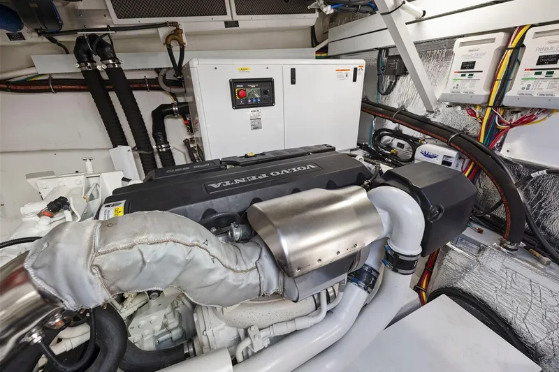 Slide: The Image of Engine room of 2019 Cruisers Yachts 54 Cantius with Volvo Penta engine. - 73