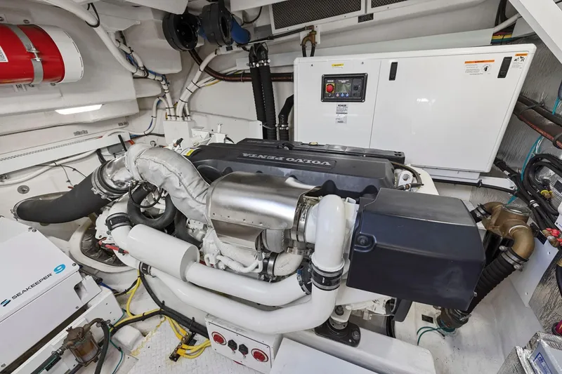 Slide: The Image of Engine room of 2019 Cruisers Yachts 54 Cantius with Volvo Penta engine. - 77