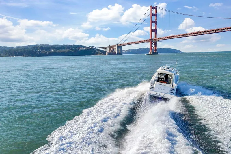 Slide: The Image of 2019 Cruisers Yachts 54 Cantius cruising near Golden Gate Bridge on a sunny day. - 98
