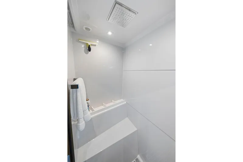 Slide: The Image of Luxurious shower area in 2019 Cruisers Yachts 54 Cantius, featuring modern fixtures and sleek design. - 55