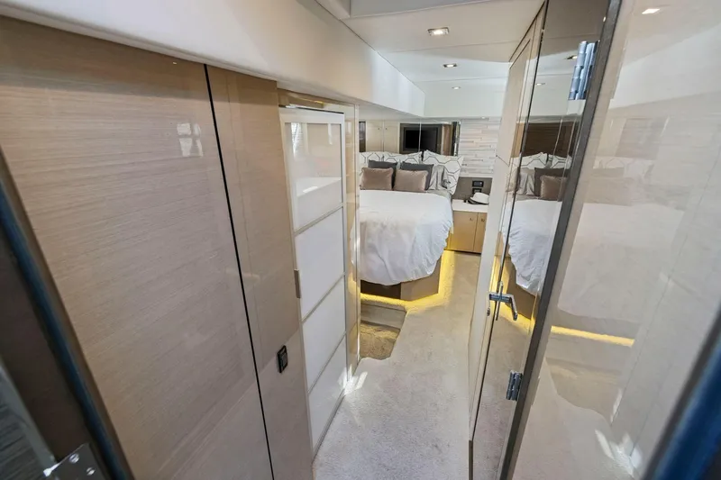 Slide: The Image of Luxurious bedroom interior of 2019 Cruisers Yachts 54 Cantius with modern design and ambient lighting. - 59