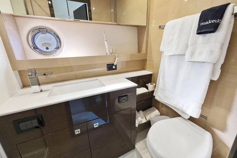 Slide: The Image of Luxurious bathroom in 2019 Cruisers Yachts 54 Cantius with modern fixtures and elegant design. - 67