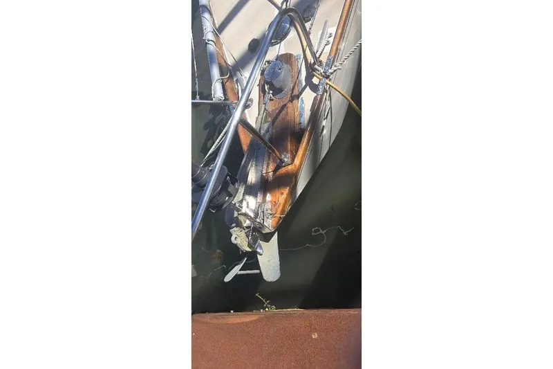 Slide: The Image of Bow of a 1978 Tartan T34c sailboat with anchor and ropes. - 7