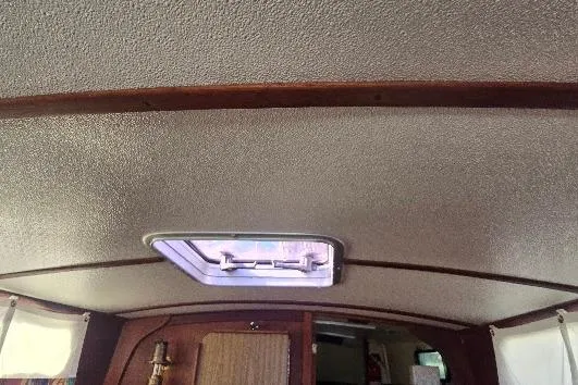 Slide: The Image of Interior ceiling of a 1978 Tartan T34c sailboat with a skylight. - 91