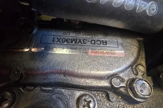 Slide: The Image of Close-up of a 1978 Tartan T34c engine component with visible serial number. - 62