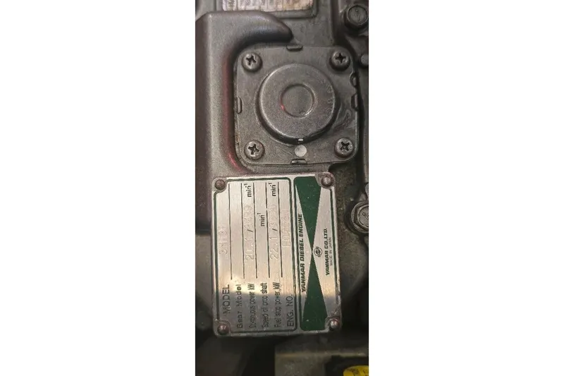 Slide: The Image of Close-up of a Yanmar diesel engine plate on a 1978 Tartan T34c. - 64