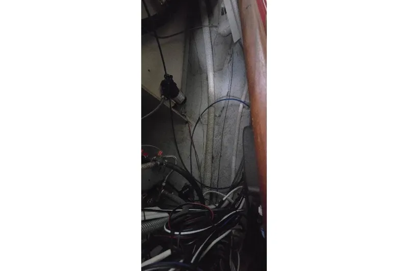 Slide: The Image of Interior wiring and components of a 1978 Tartan T34c sailboat. - 79