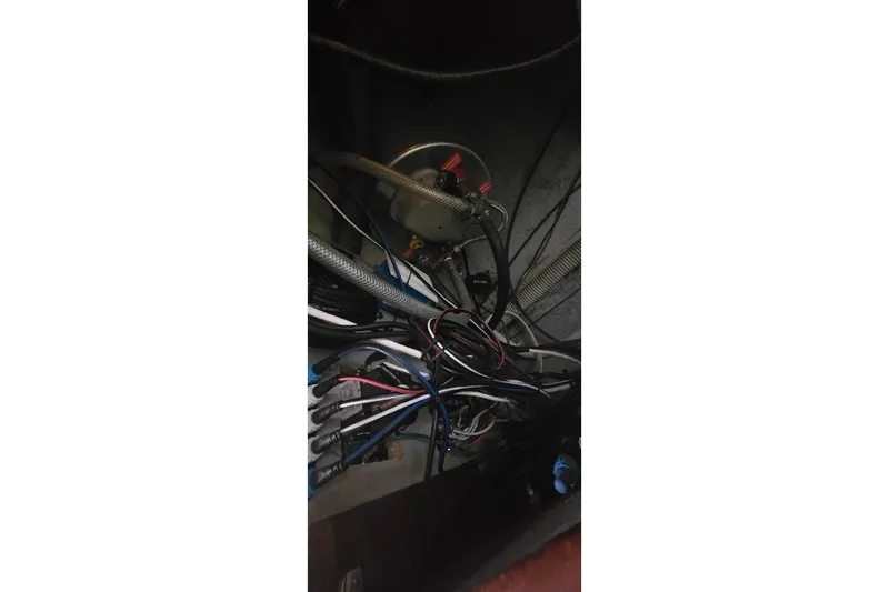 Slide: The Image of Tartan T34c 1978 boat wiring and plumbing system in a confined space. - 80