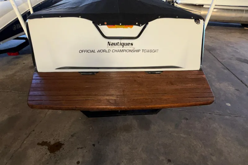 Slide: The Image of 1995 Correct Craft Ski Nautique boat with wooden platform, labeled "Official World Championship Towboat." - 15