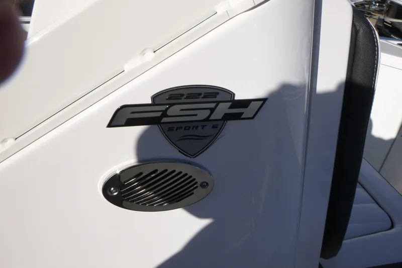 Slide: The Image of 2026 Yamaha Boats 222 FSH Sport E logo on white surface. - 20
