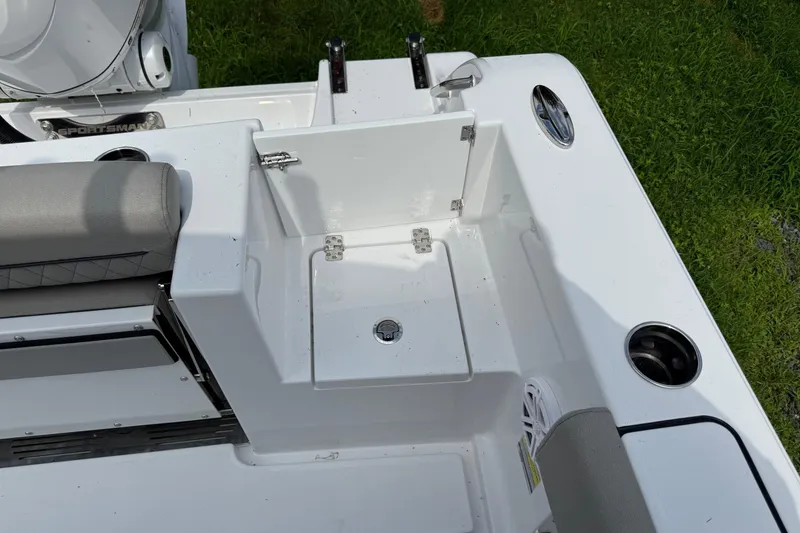 Slide: The Image of 2026 Sportsman Open 252 Center Console boat interior with seating and storage compartments. - 10