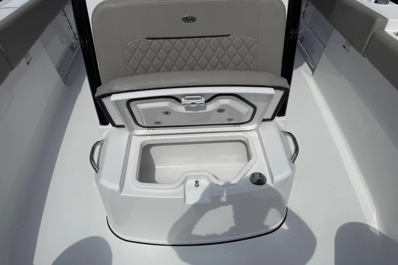 Slide: The Image of 2026 Sportsman Open 252 Center Console boat with open storage compartment. - 22