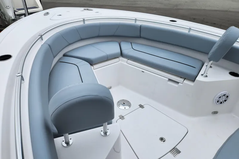 Slide: The Image of 2026 Sportsman Heritage 231 Center Console boat with spacious seating area. - 10
