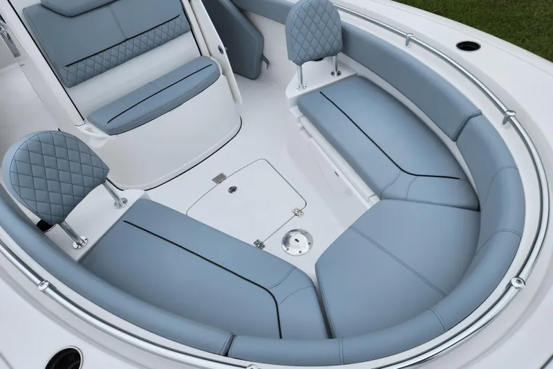 Slide: The Image of 2026 Sportsman Heritage 231 Center Console boat with luxurious seating and modern design. - 11
