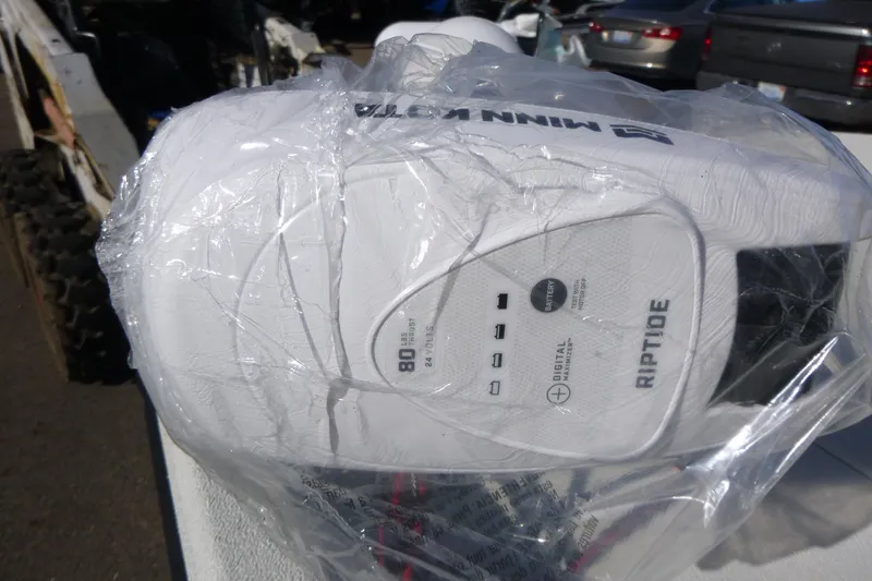 Slide: The Image of Ranger RB210 2025 model with Minn Kota Riptide motor, wrapped in plastic. - 8