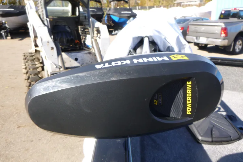 Slide: The Image of Minn Kota PowerDrive motor on 2026 Tracker Pro Guide V-16 SC boat, outdoor setting. - 7