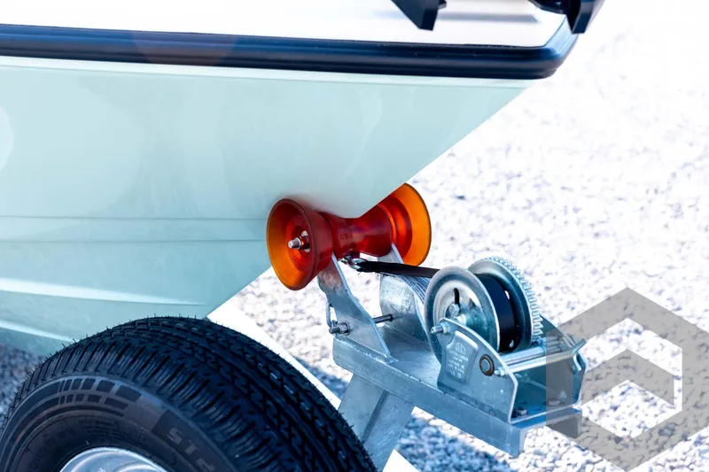 Slide: The Image of Trailer hitch and winch system on 2026 Pathfinder 2200 TRS boat. - 10