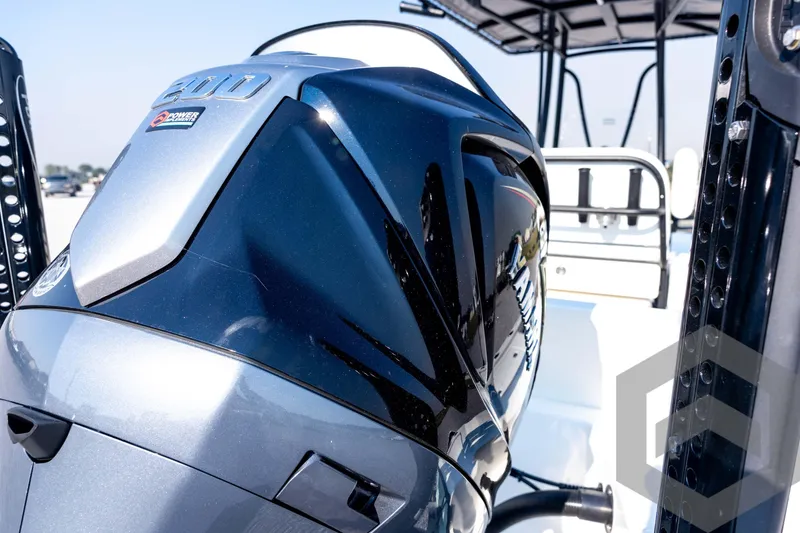 Slide: The Image of 2026 Pathfinder 2200 TRS boat with powerful outboard motor, sleek design. - 19