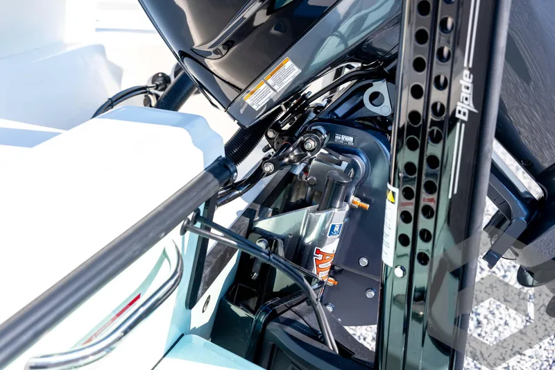 Slide: The Image of Close-up of 2026 Pathfinder 2200 TRS boat engine and hydraulic system. - 22