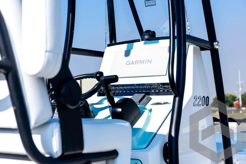 Slide: The Image of 2026 Pathfinder 2200 TRS boat console with Garmin navigation system, close-up view. - 35