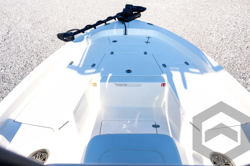 Slide: The Image of 2026 Pathfinder 2200 TRS boat deck with storage compartments and trolling motor. - 36