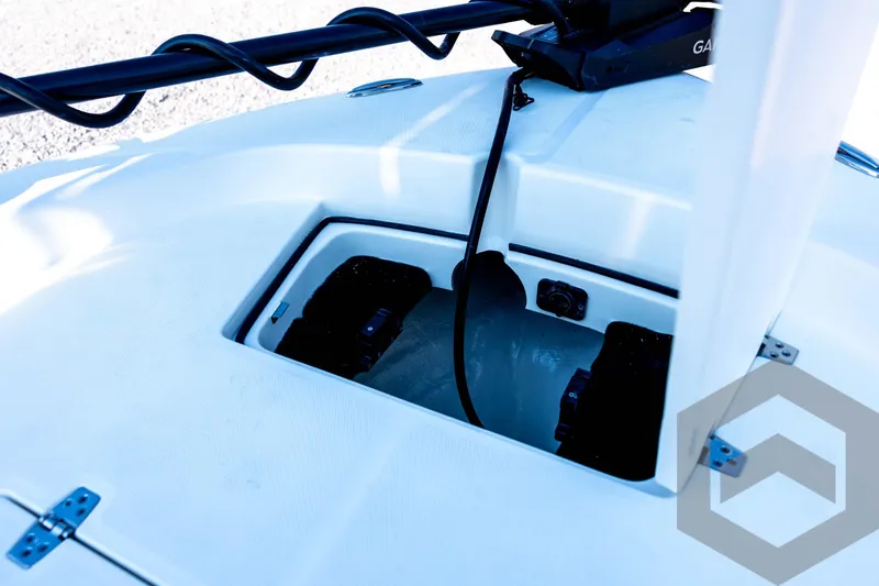 Slide: The Image of 2026 Pathfinder 2200 TRS boat compartment with wiring and equipment. - 38